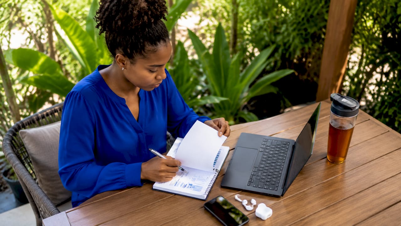 Investor woman on call preparing exit strategy