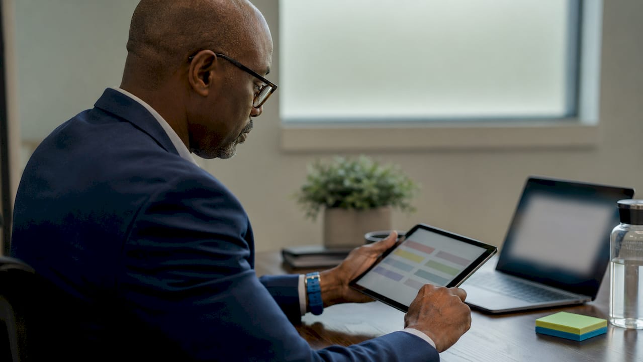Professional using AI and human judgment for email sorting