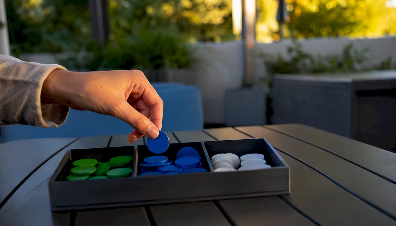 Hand placing ticket load marker