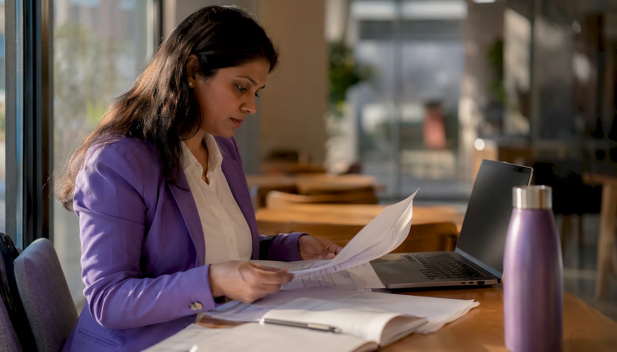 Woman working on client workflow automation