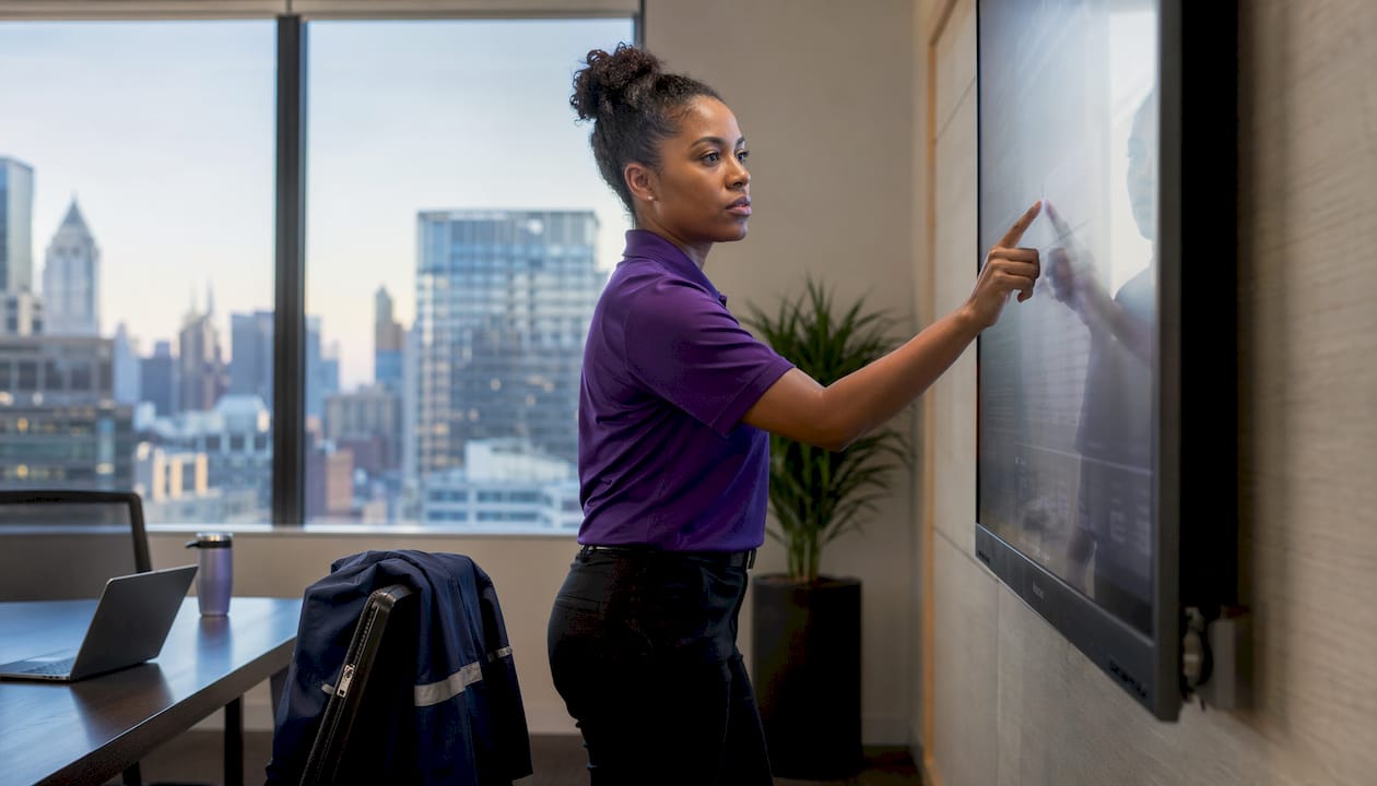 Superintendent using touchscreen for workflow automation