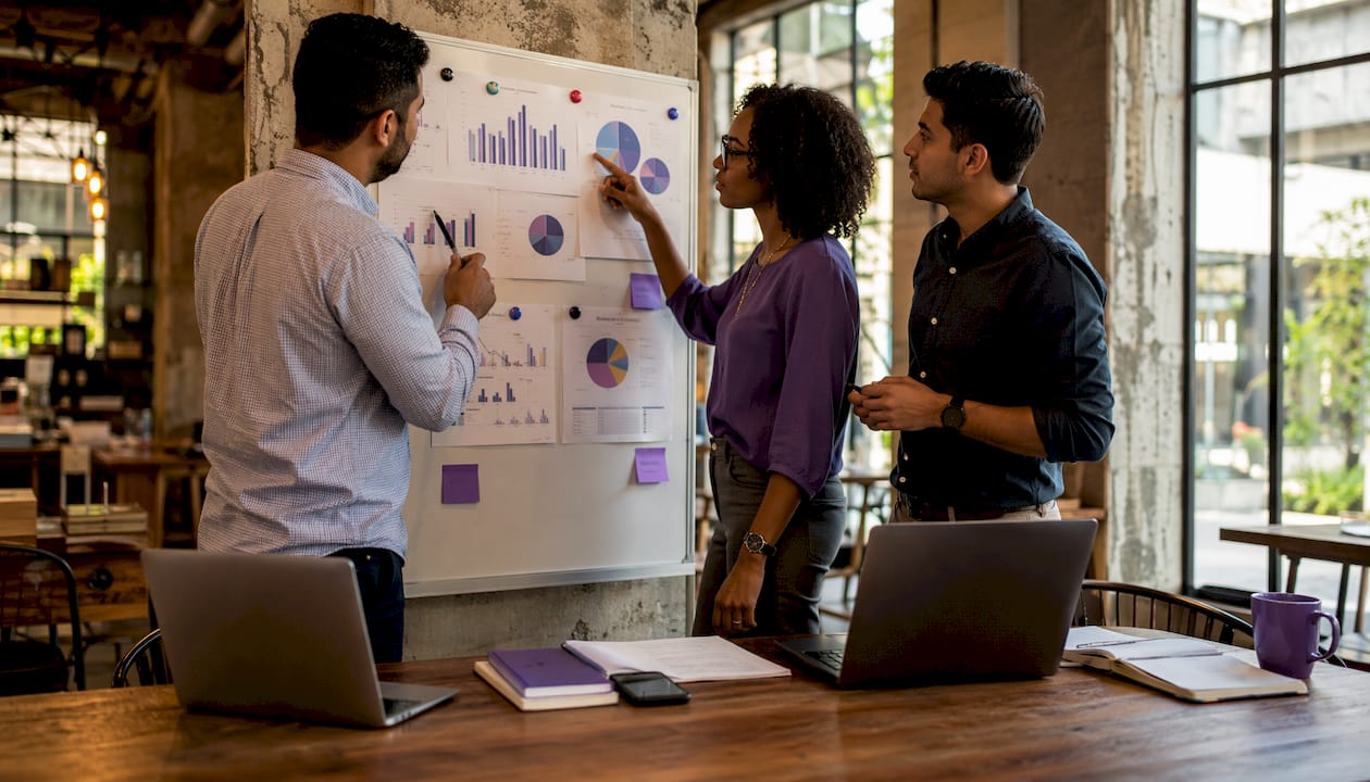 Team collaborating on onboarding analytics