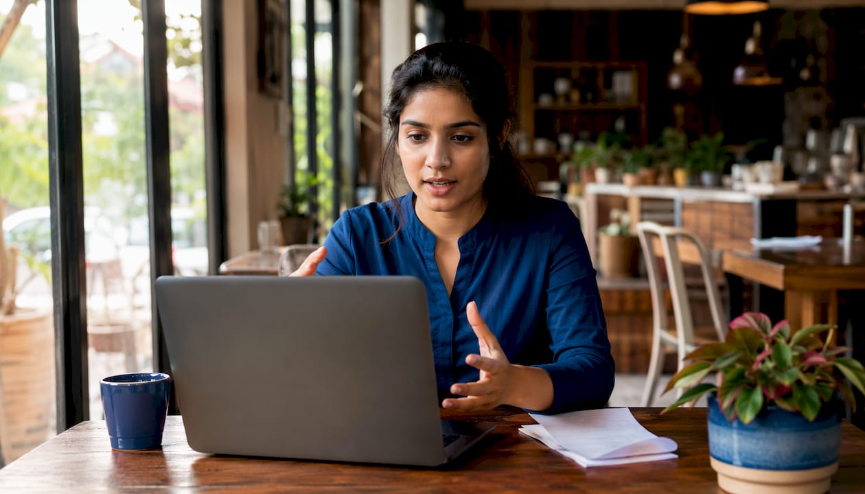 Woman verifying cash buyer during video call