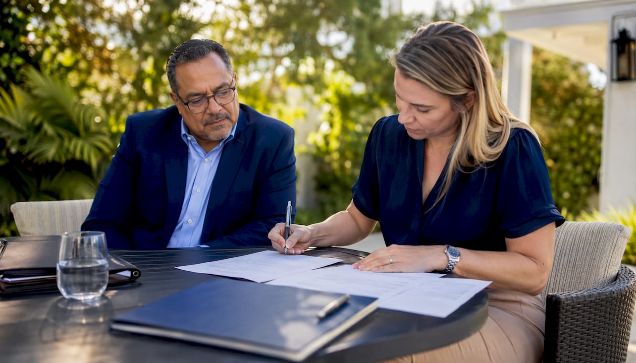Notary witnessing closing signatures