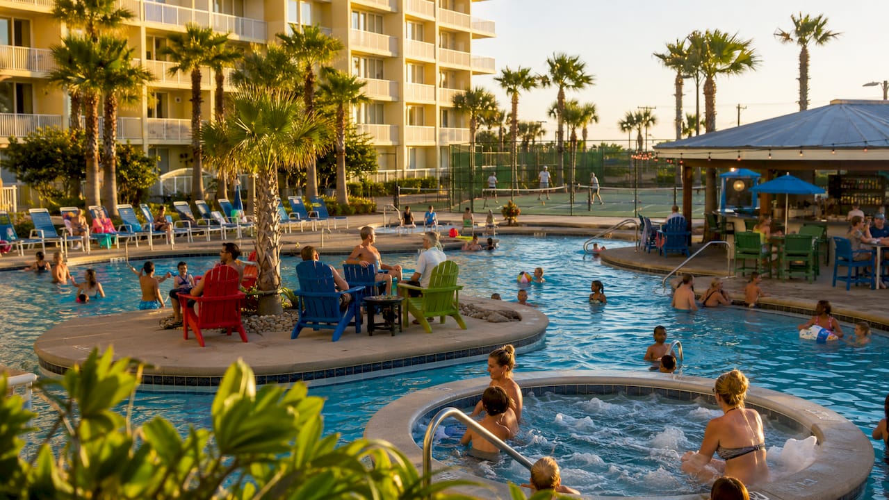 Majestic Beach Resort pool and tennis court area