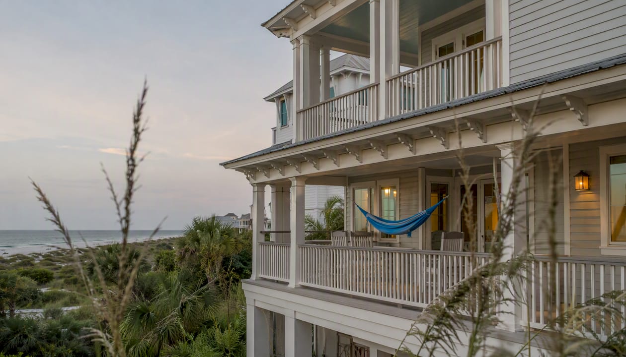 Large Gulf Coast beach house exterior with balconies