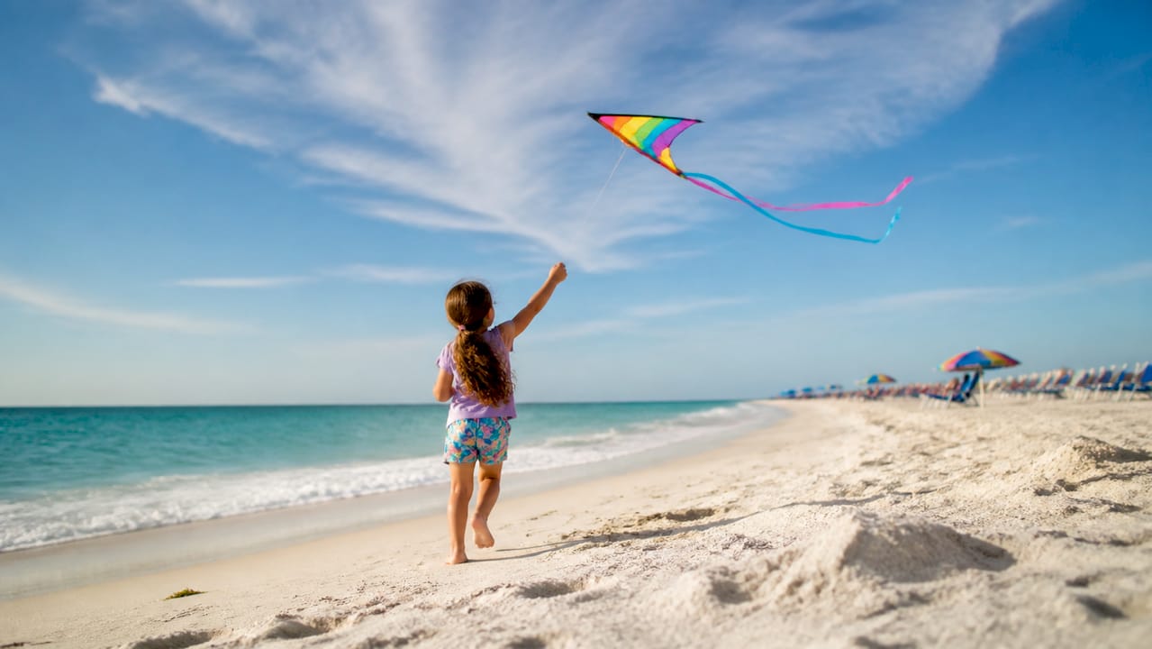 Child flying kite on Panama City Beach