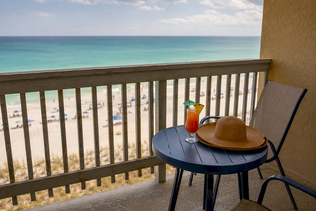 Beachfront condo balcony overlooking Gulf waters