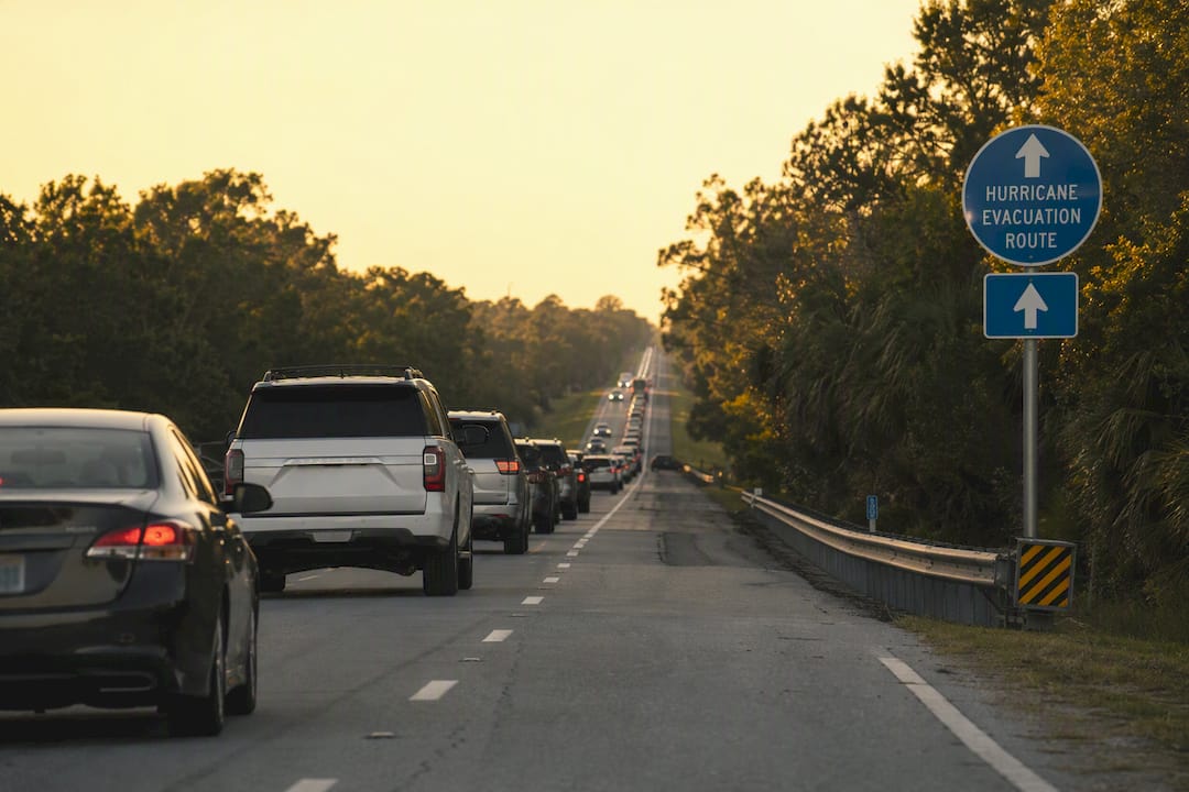 Evacuation traffic on Highway 59 at sunrise