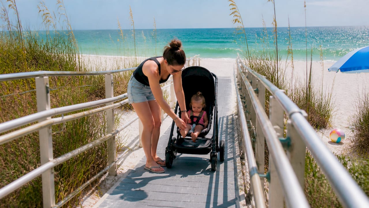 Family using ADA beach ramp at Miramar Beach