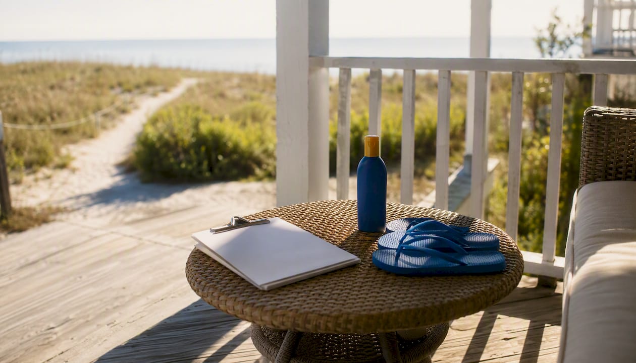 Vacation rental porch with guest welcome items