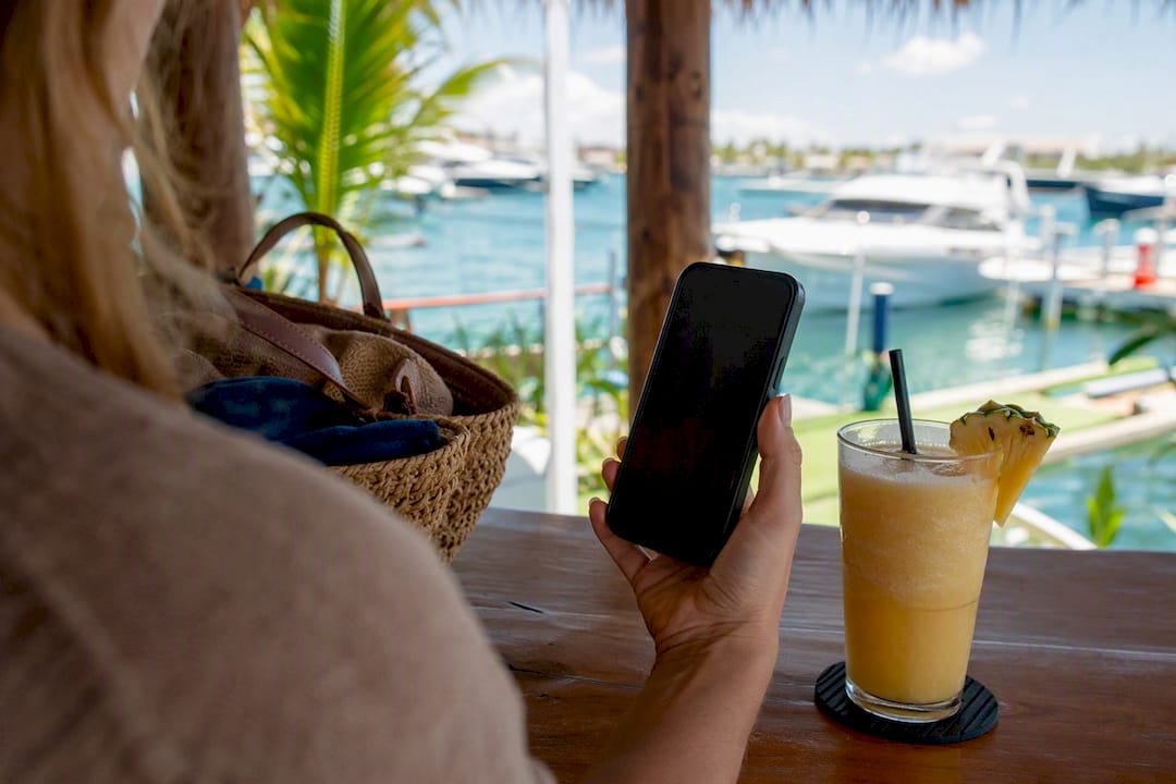 Smartphone showing minimal rental listing photos