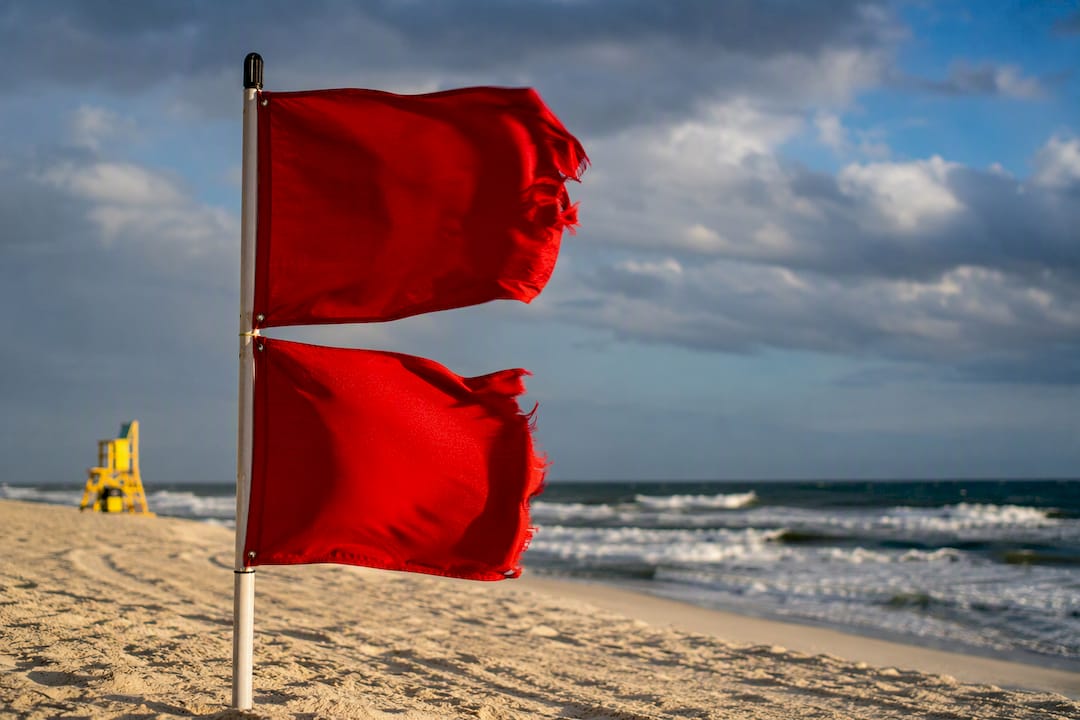Double Red Is Illegal: Gulf Shores Beach Flag Meanings and Rentals