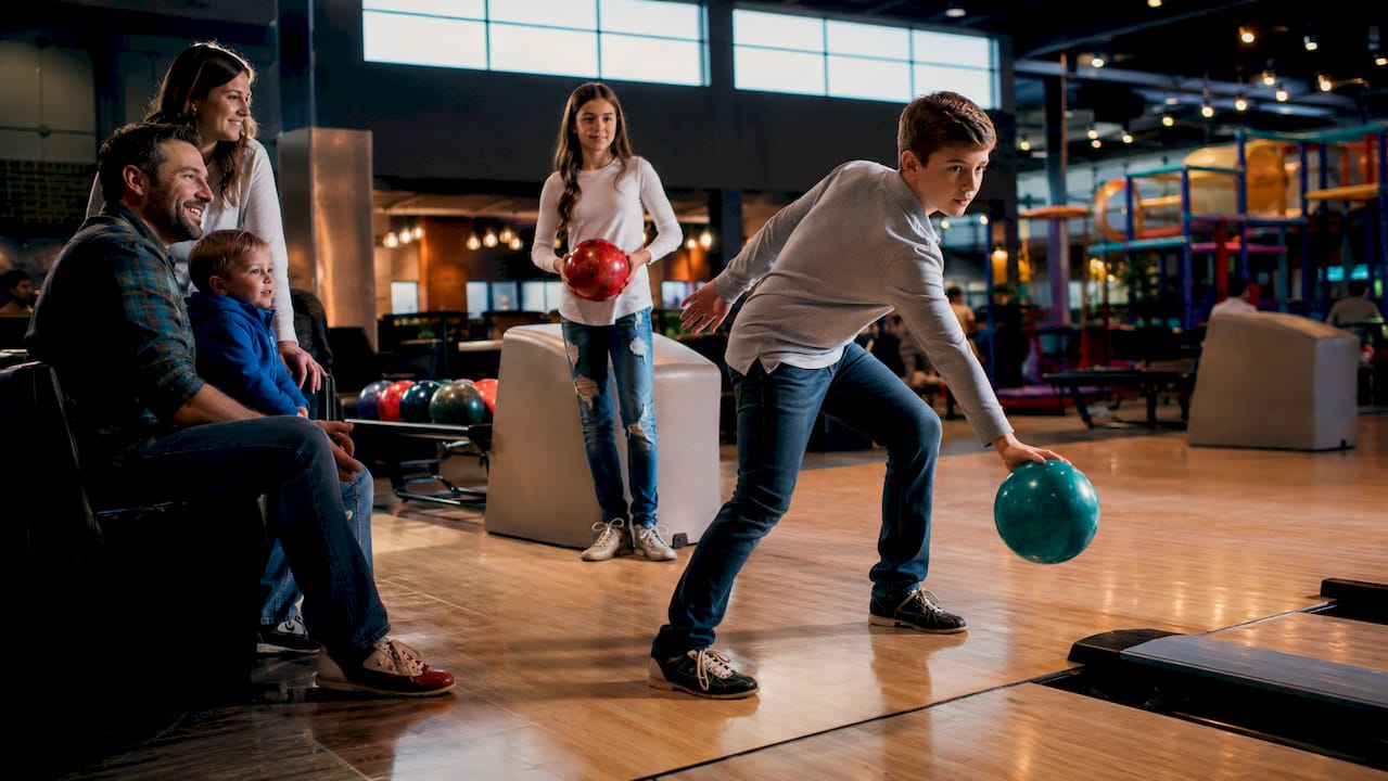 Family sharing activities at indoor center