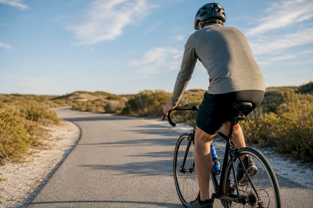 Cyclist on a quiet winter 30A path