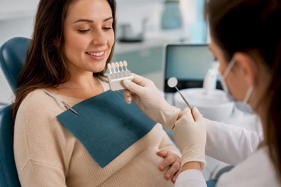 Dentist reviewing patient smile before whitening