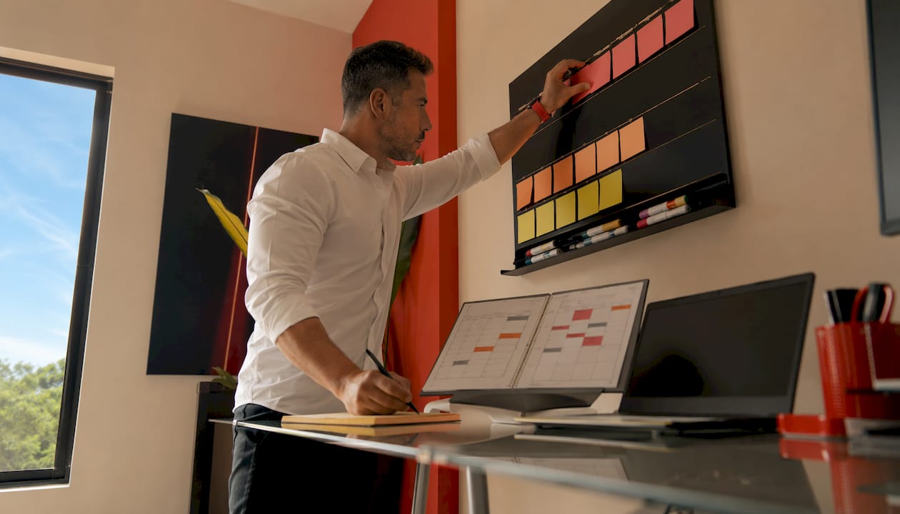 Small studio owner setting up scheduling software