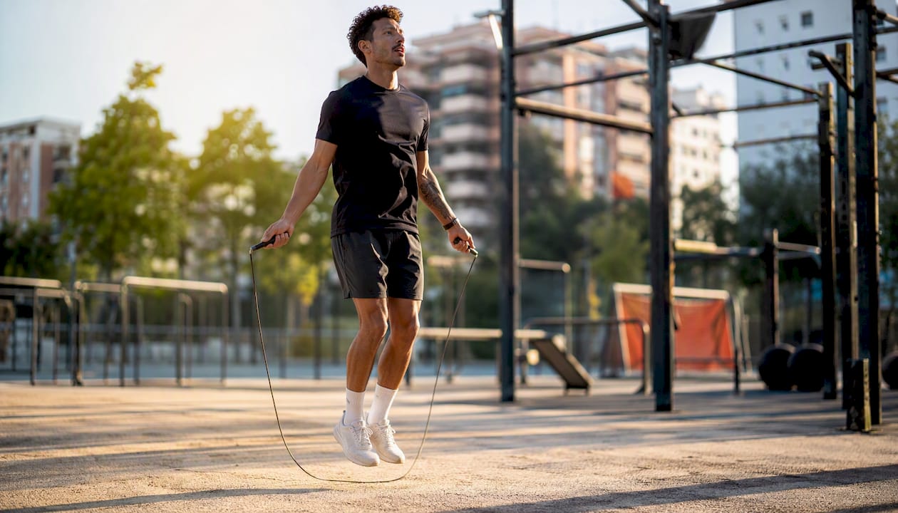 Athlete jumping rope during fitness challenge