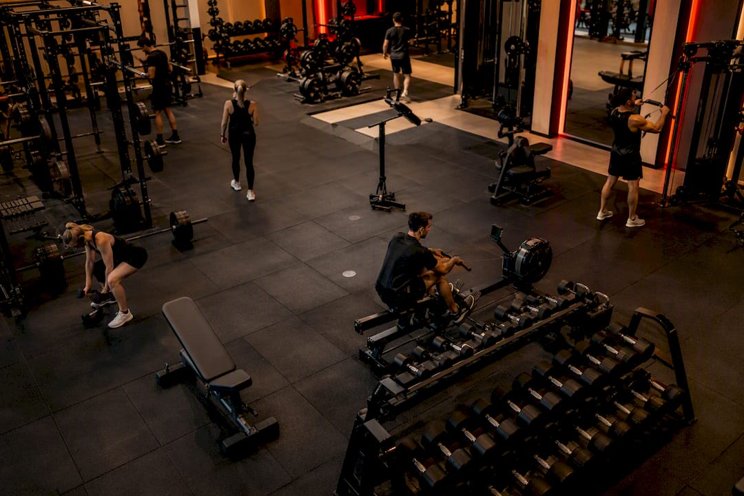 Gym members working out in efficient gym space
