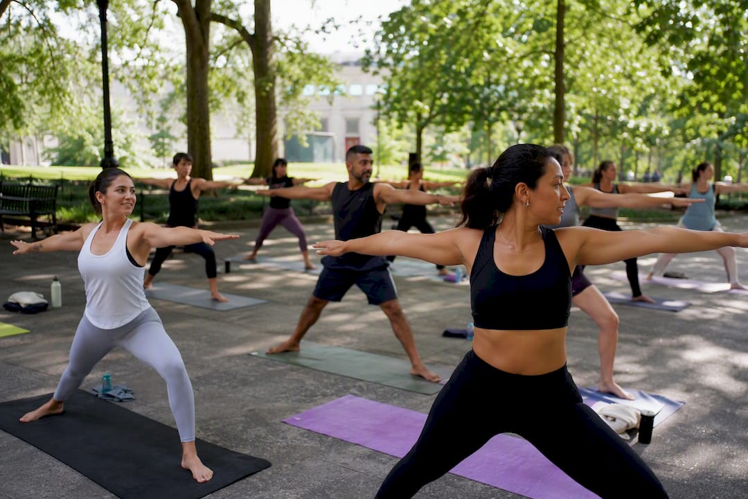 Group fitness cohort in synchronized workout