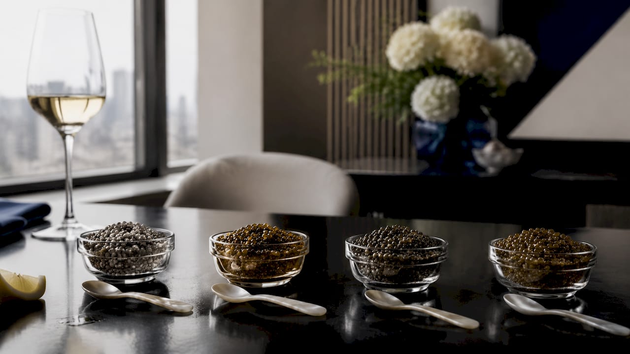 Overhead view of different gourmet caviar varieties in bowls