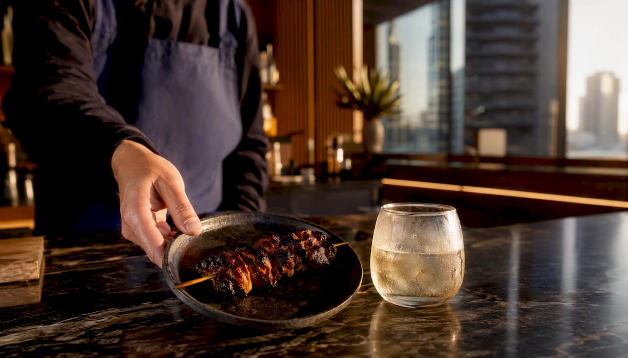 Mezcal glass and wagyu skewer pairing