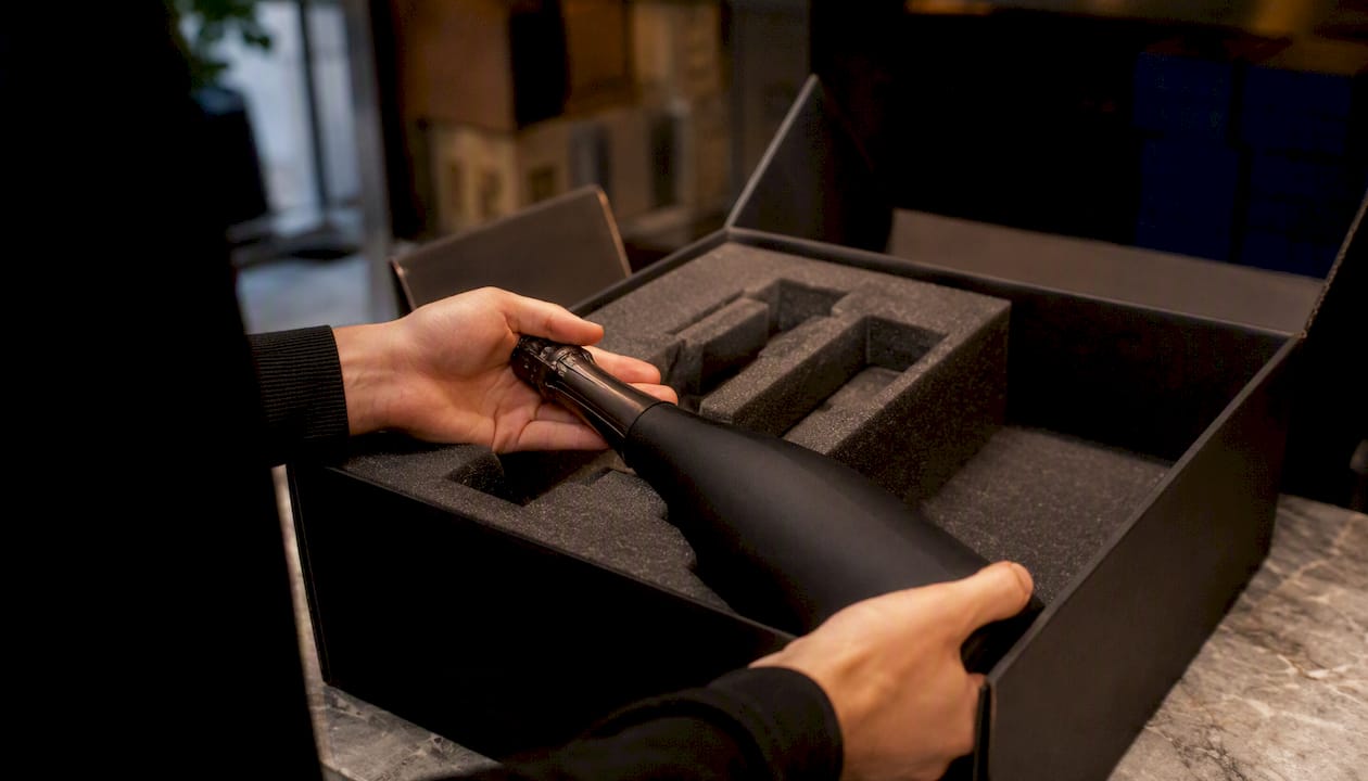 Champagne bottle in protective packaging