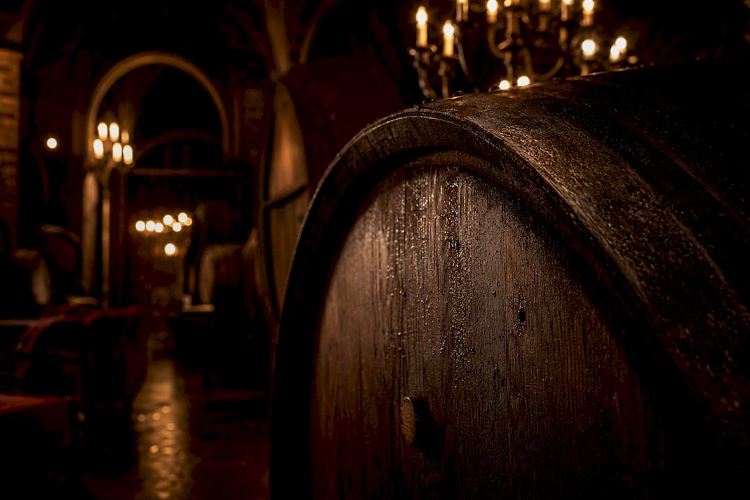 Wine barrels in cellar under soft light