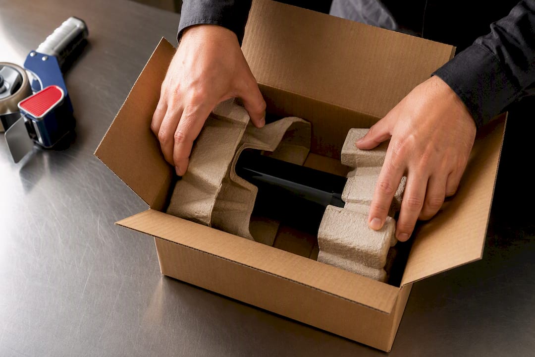 Protective packaging around wine parcel