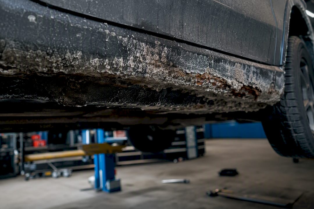 Wheel well with salt and sand corrosion