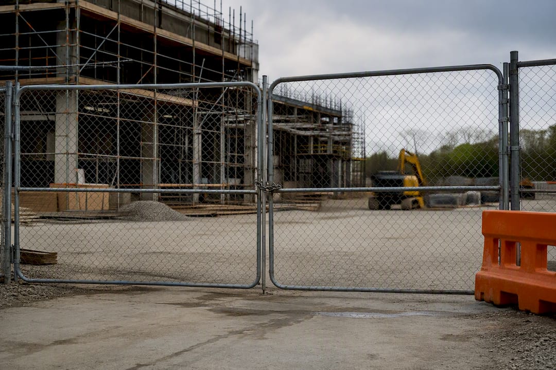 Secured construction site with work stopped