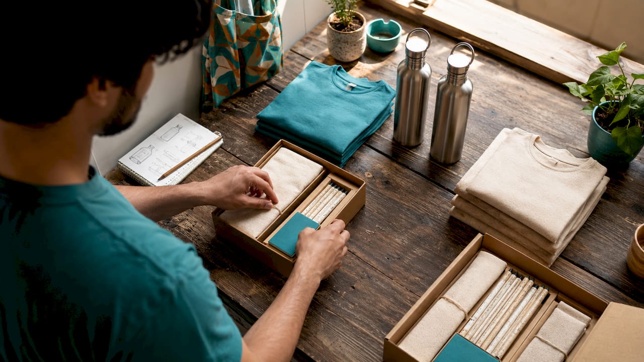 Artisan arranging sustainable corporate gift items