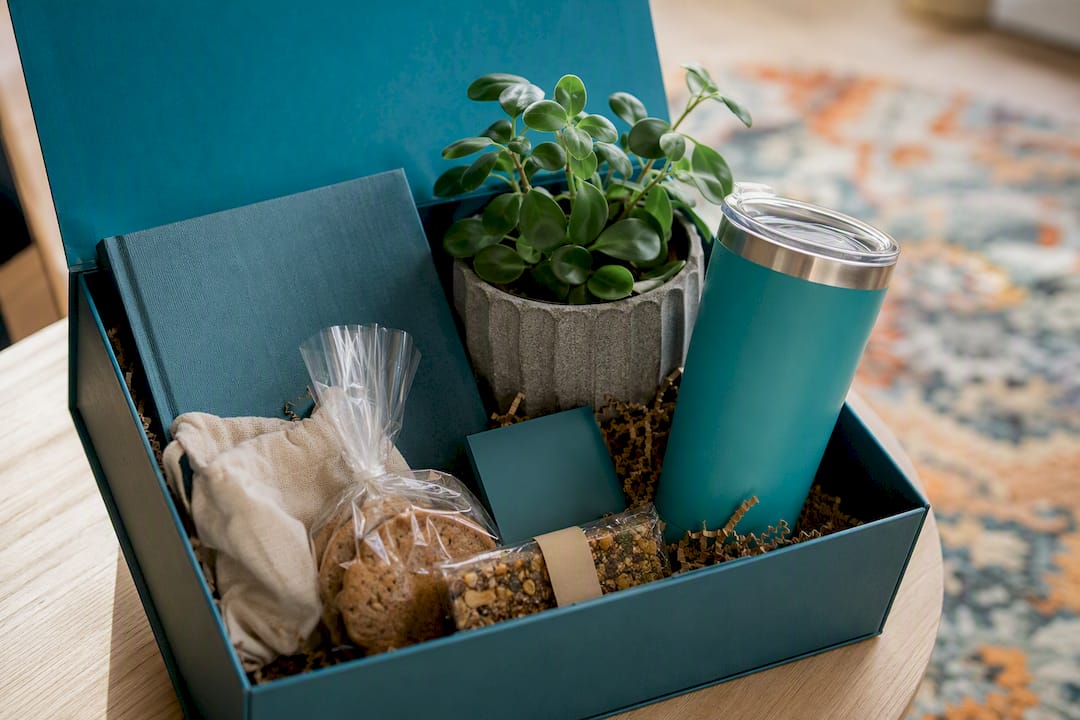 Curated corporate gift box contents overhead view