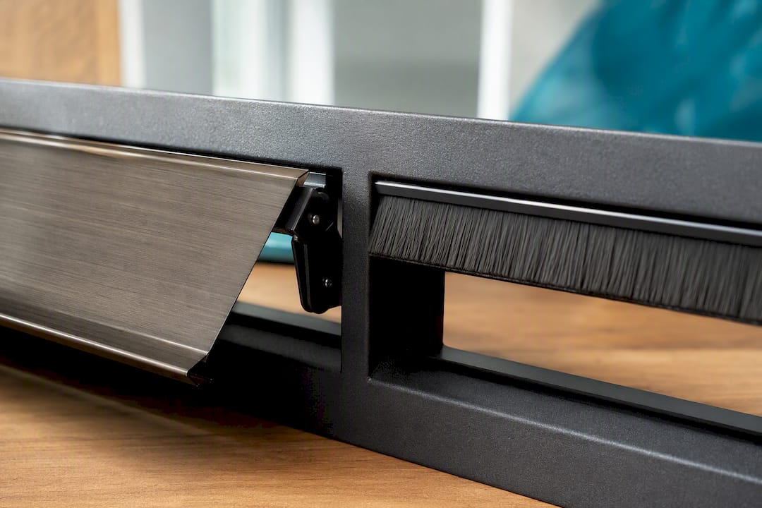 Bristle seal and hinged letterbox flap