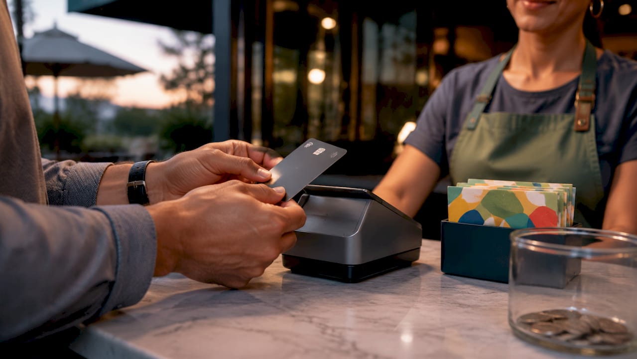 Customer using card reader at mobile food truck