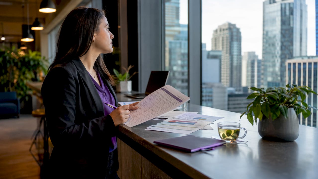 Compliance officer reviewing ISO 27001 audit checklist