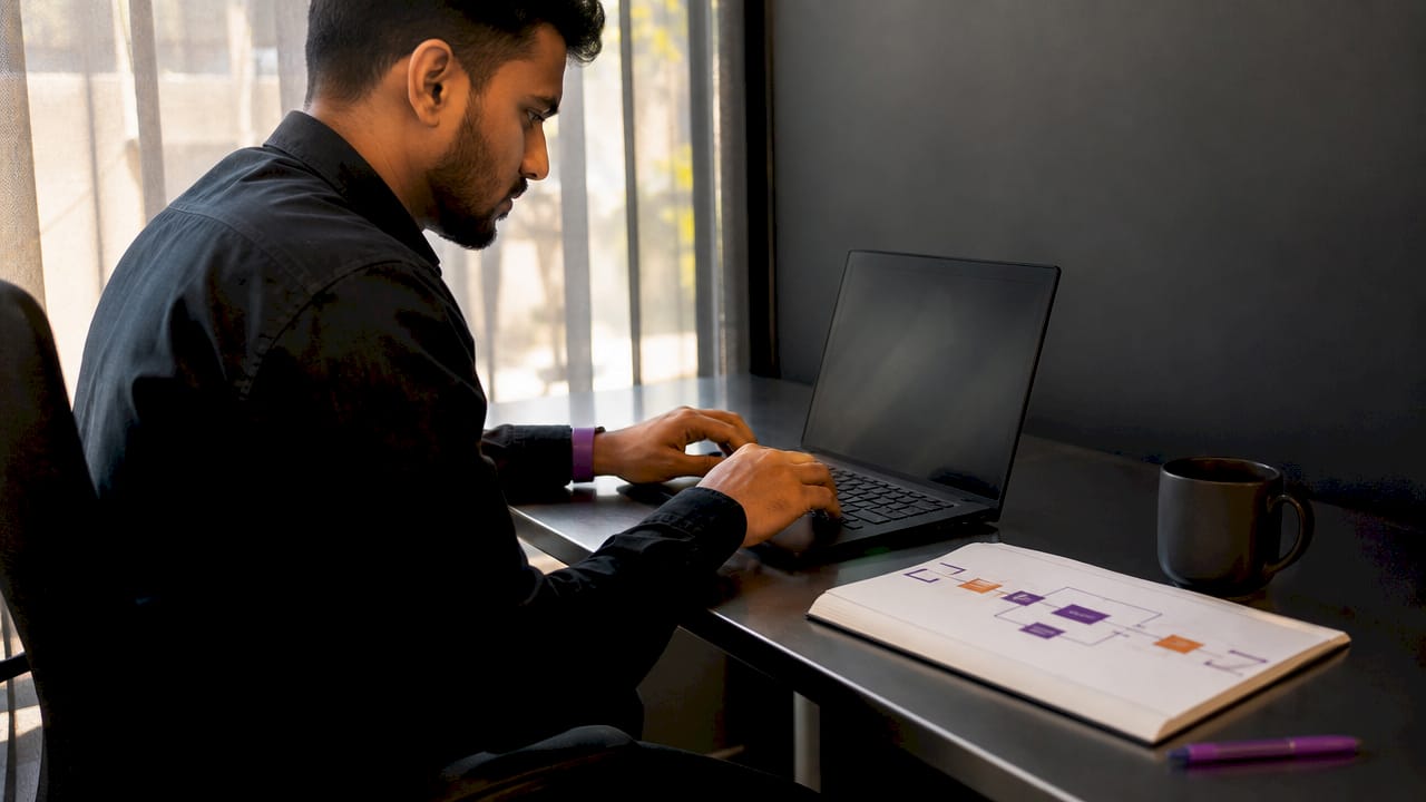 IT administrator adjusting RBAC settings at desk