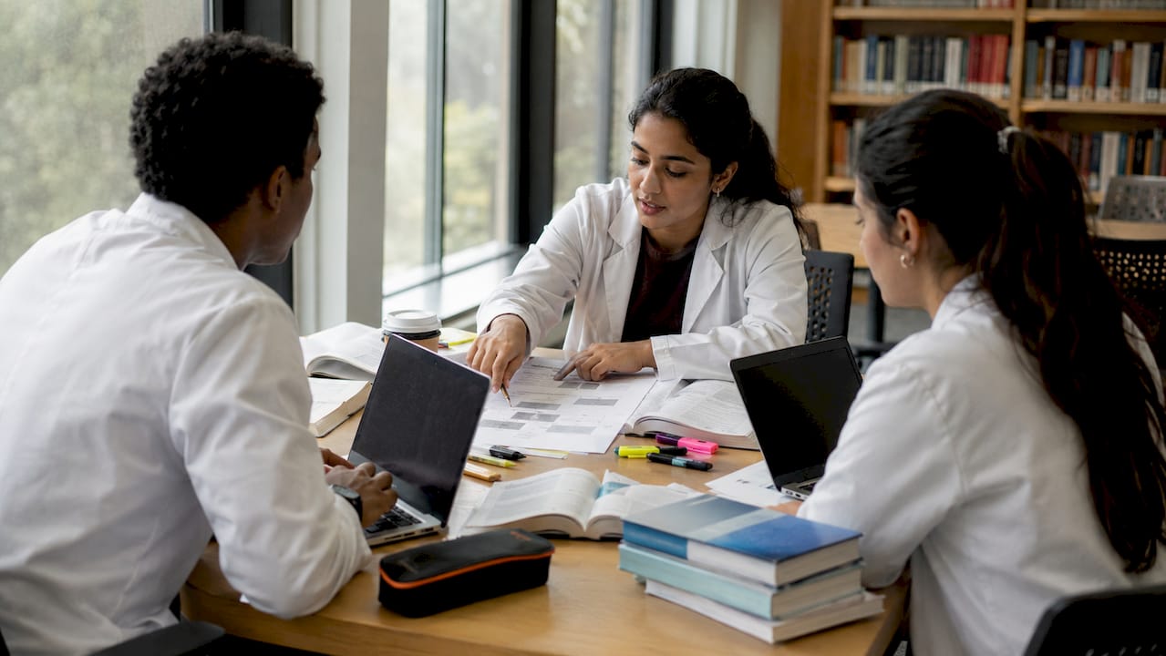 Group of medical students studying exam blueprint together