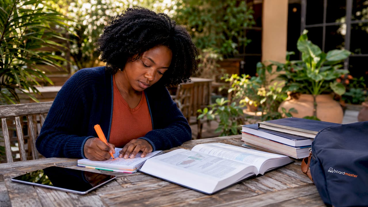 Student using tablet to generate medical exam questions