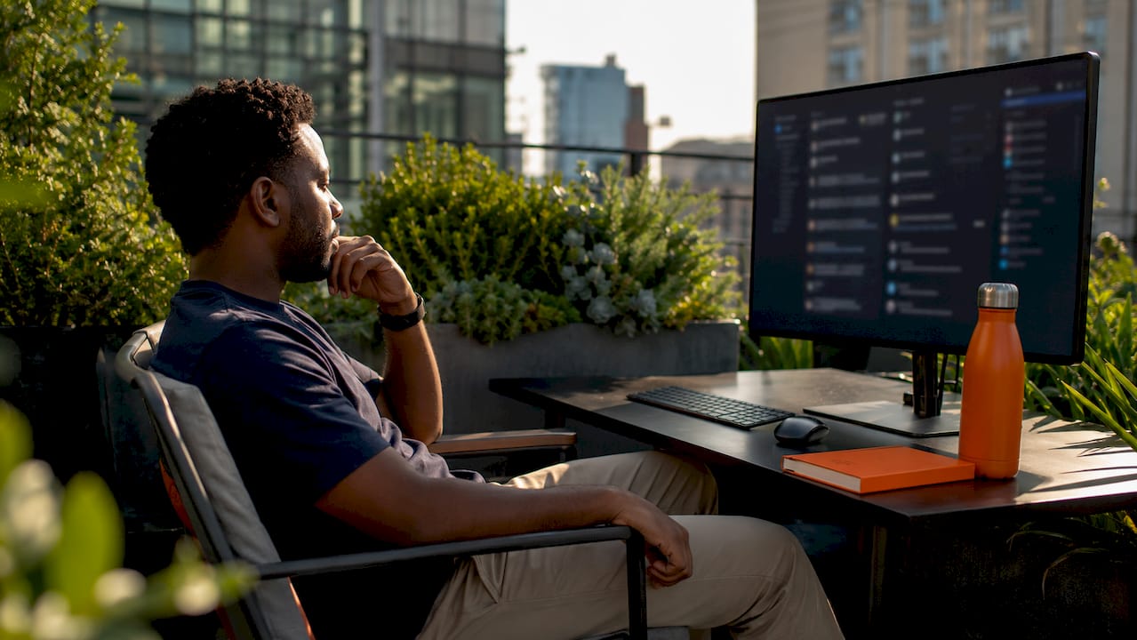 Man working on decentralized social media platform