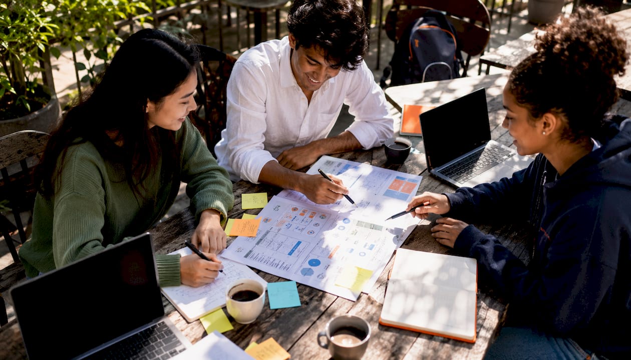 Group discussing medical study tools at table