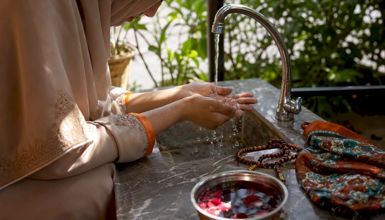 Hands washing in wudu before prayer