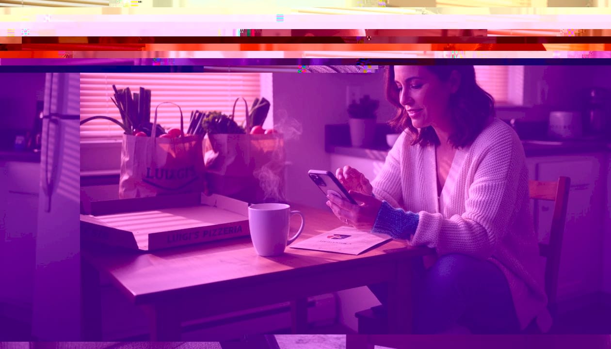 Man tracking finances on tablet in living room