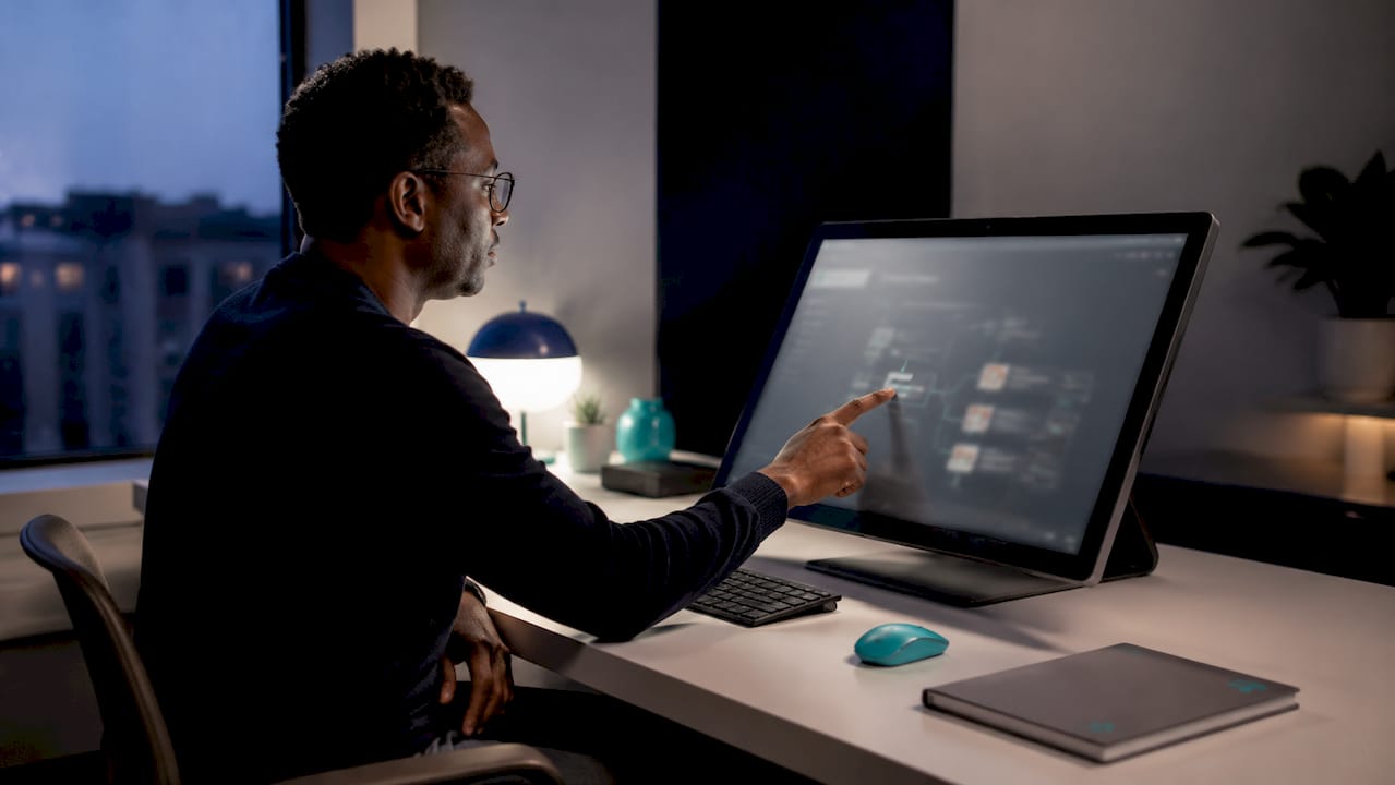 Workspace showing GDPR data workflow on touchscreen