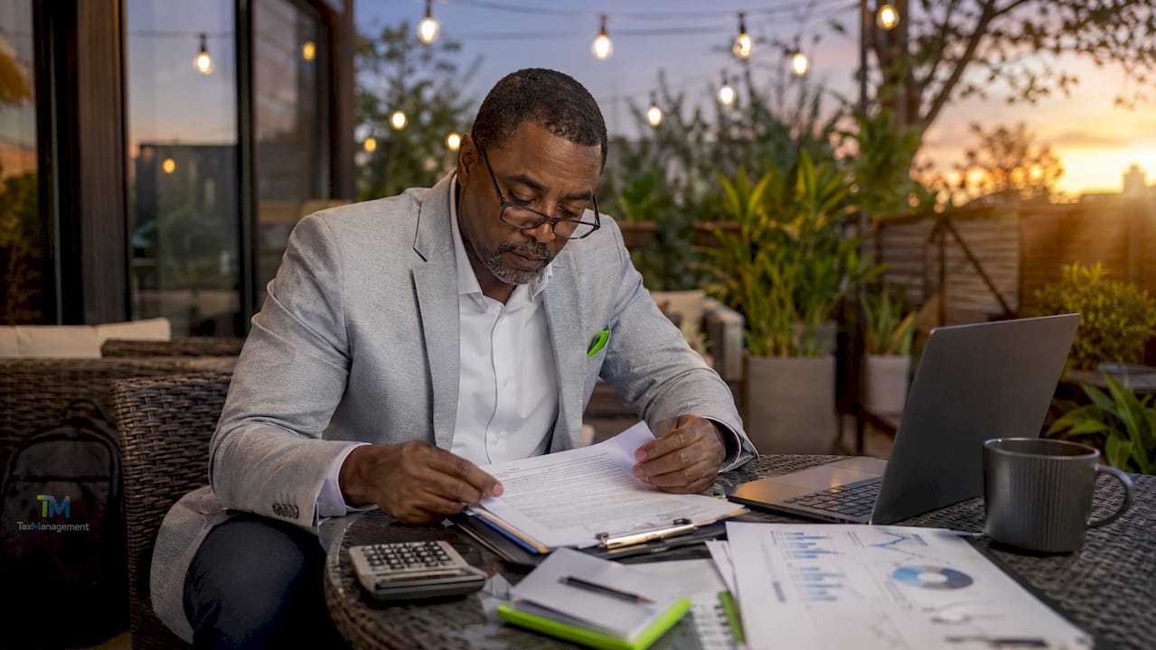 Hands signing LLC operating agreement