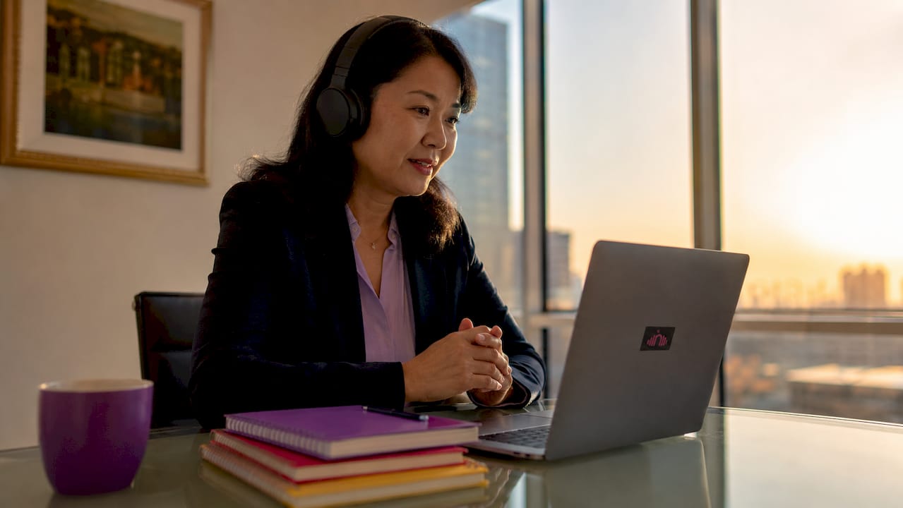 Woman practicing pronunciation with tablet