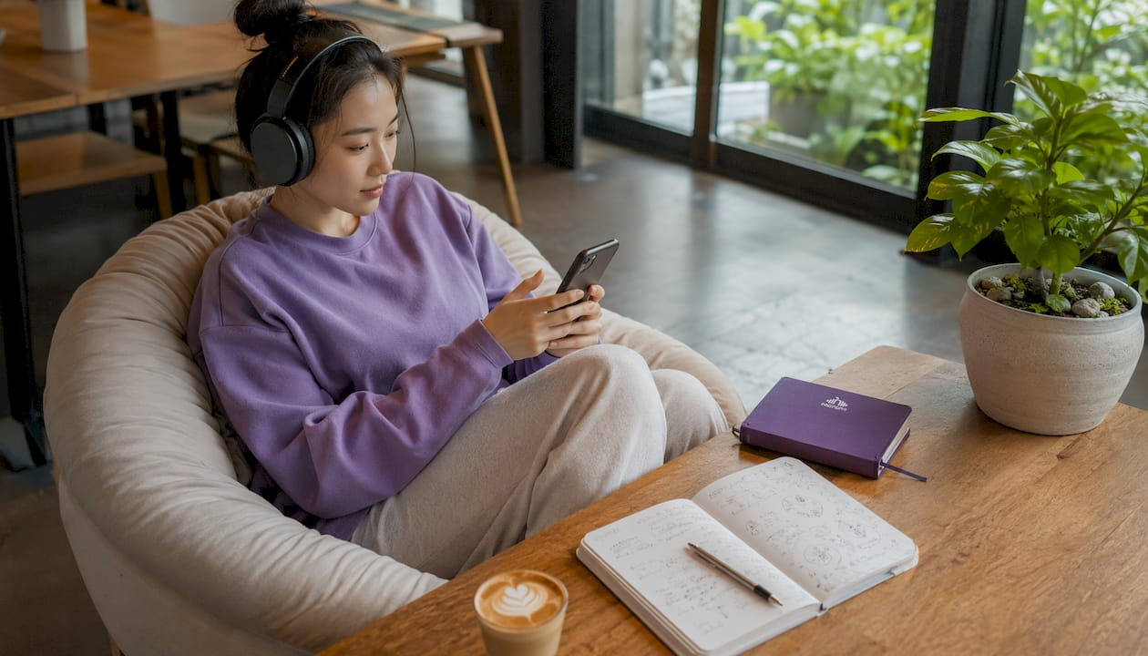 Young woman using device for accent training