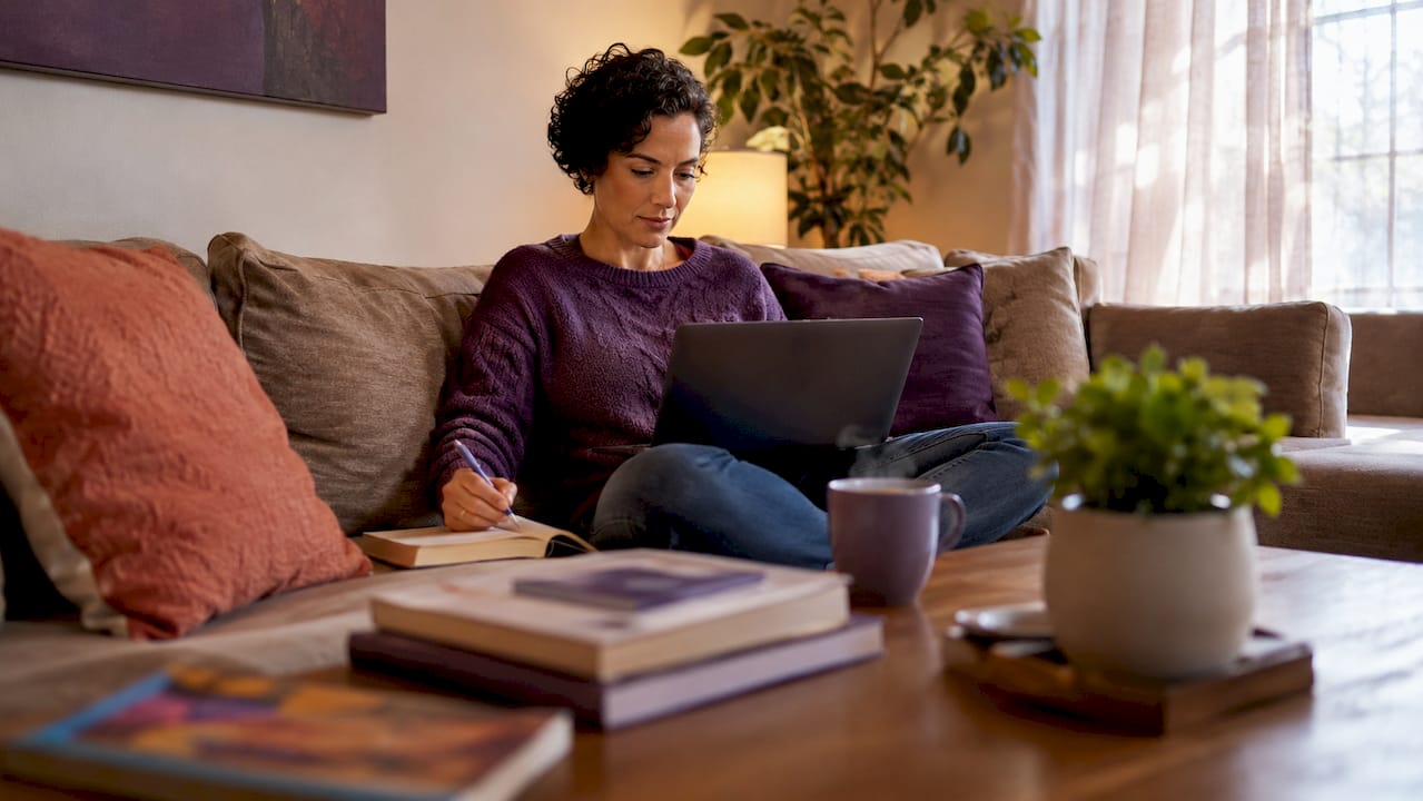 Woman attending online co-parenting counselling at home