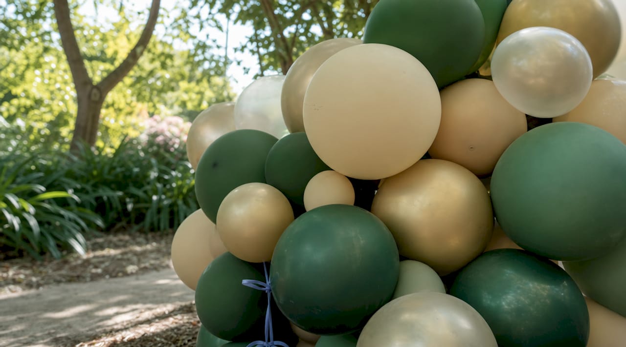 Balloon Cluster Design: A Complete Event Decor Guide Close-up of multi-texture balloon cluster indoors