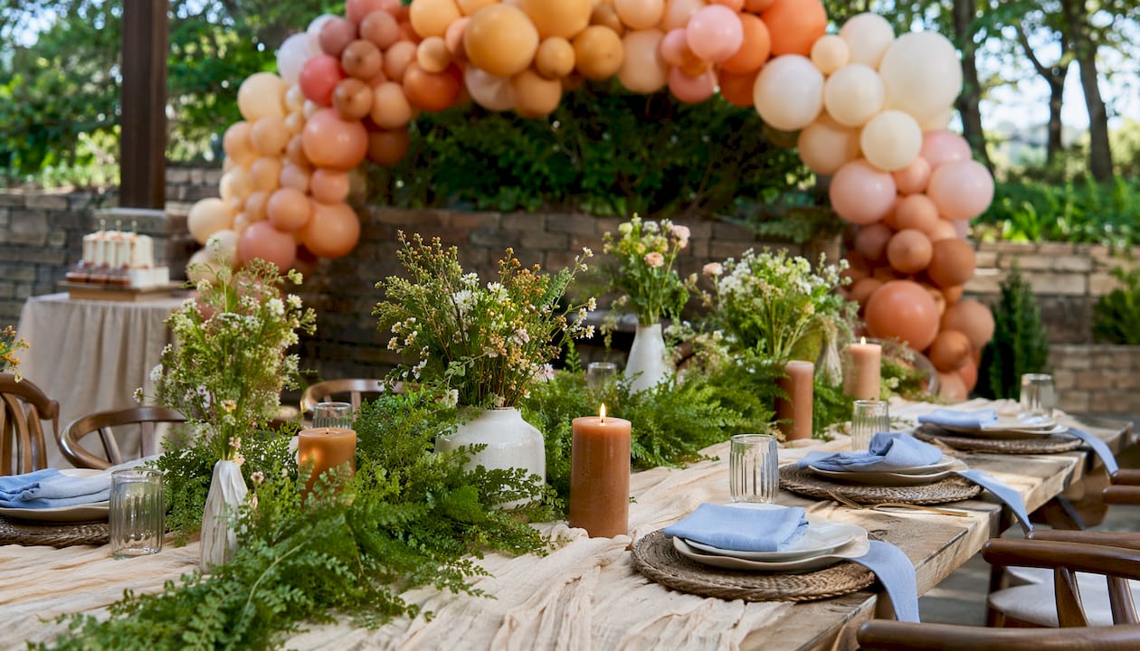 What Is a Themed Baby Shower in Atlanta? Your 2026 Planning Guide Botanical baby shower table with balloons and florals